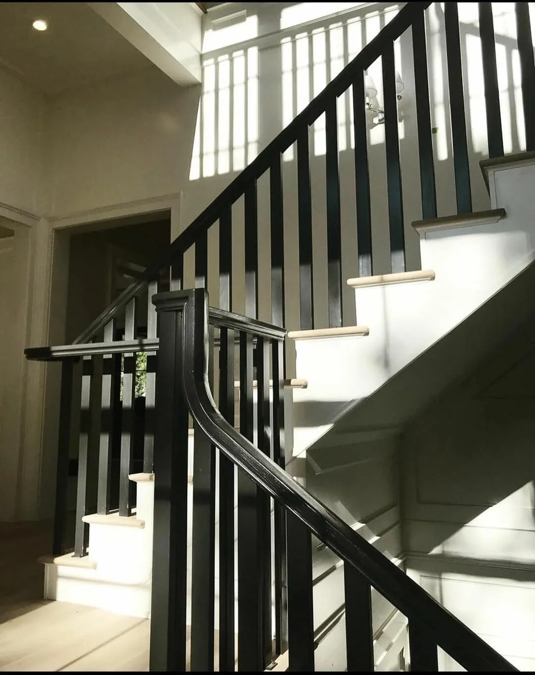 Custom stairway and hand railings by TG Woodworking